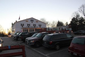 YFD parking lot is full of member's vehicles. Squad 2 and Truck 8 get ready to depart for the parade line-up
